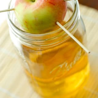 Homemade Apple-Infused Vodka in jar