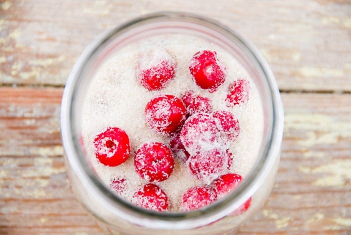 sugar and cherries in Mason jar