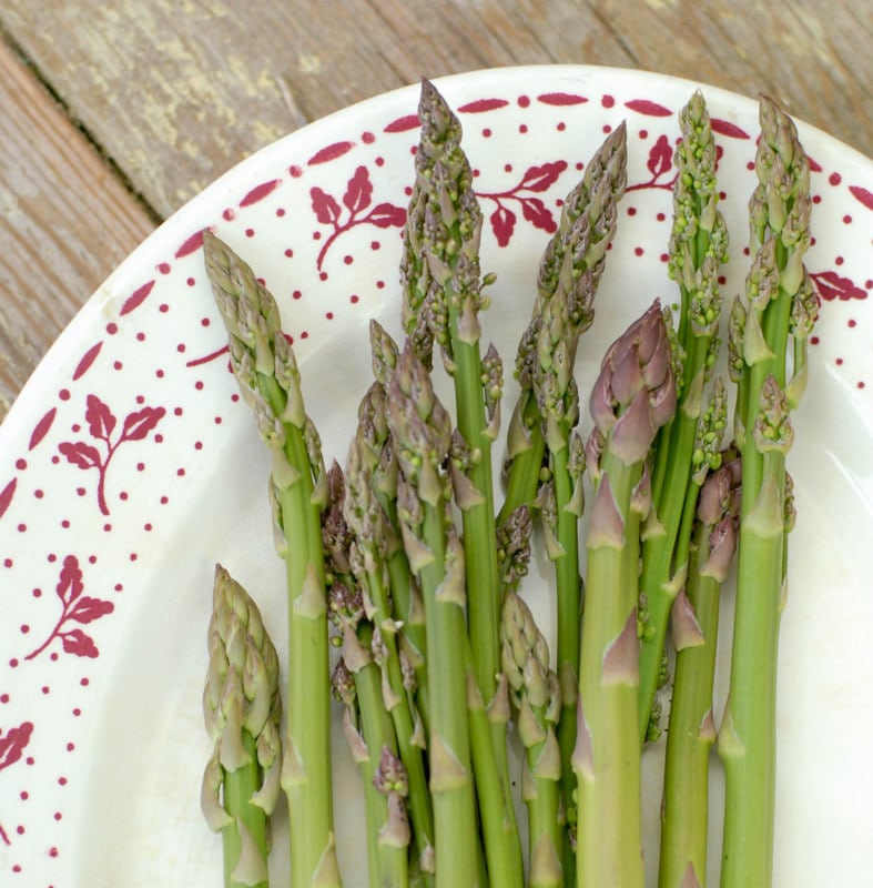 platter of uncooked wild asparagus