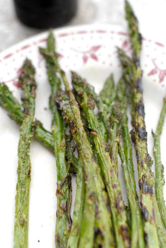 grilled asparagus on a floral platter