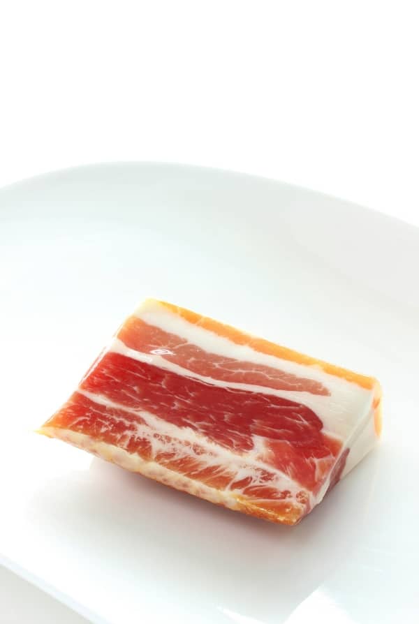 Pancetta on a white plate