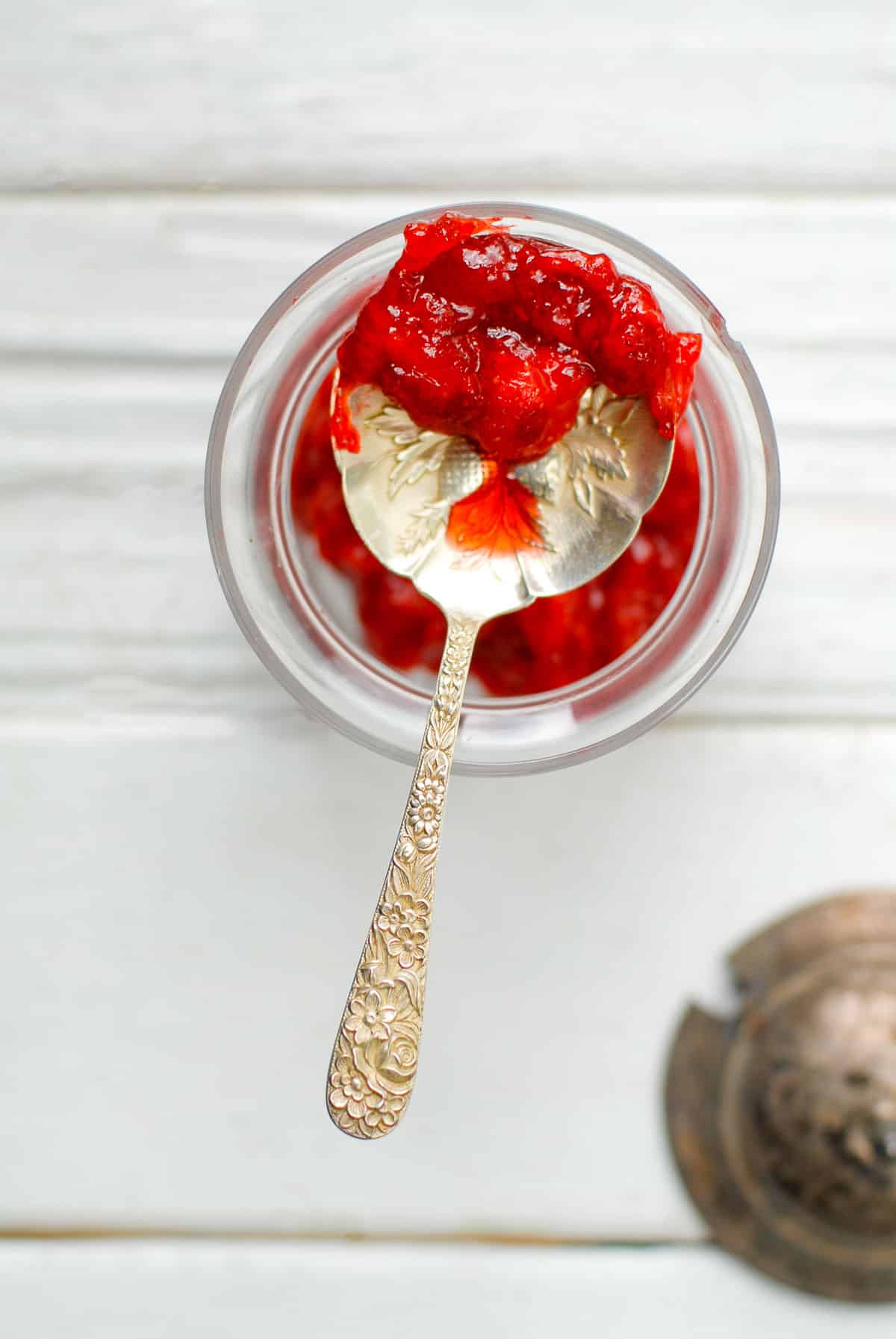 homemade strawberry jam on antique spoon