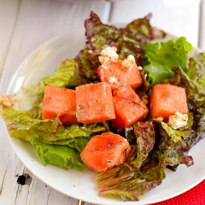 watermelon goat cheese salad close up on a plate