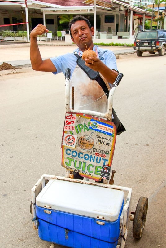 Fresh coconut milk street vendor with cooler in Costa Rica