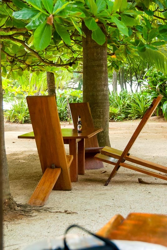 teak wood chair on the beach at Lola's playa avellana Costa Rica