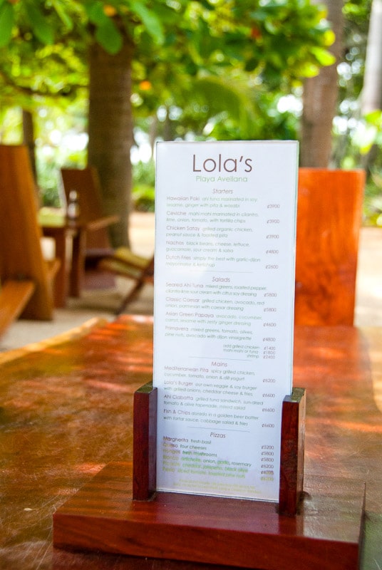 Menu on wood table at Lola's Playa Avellana - Guanacaste Costa Rica