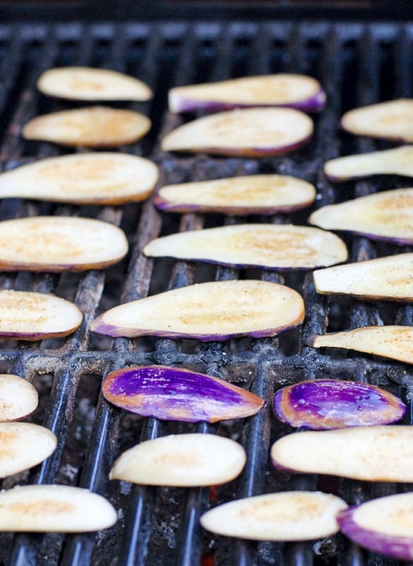 fairy tale eggplant slices on the grill.