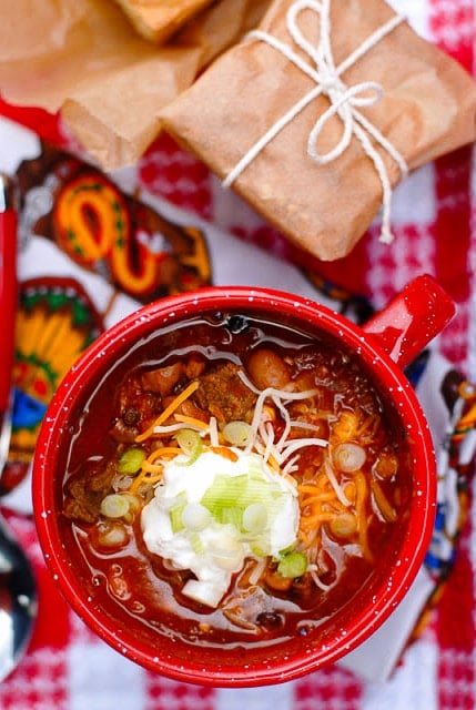 red chili in a red enamel cup with sour cream