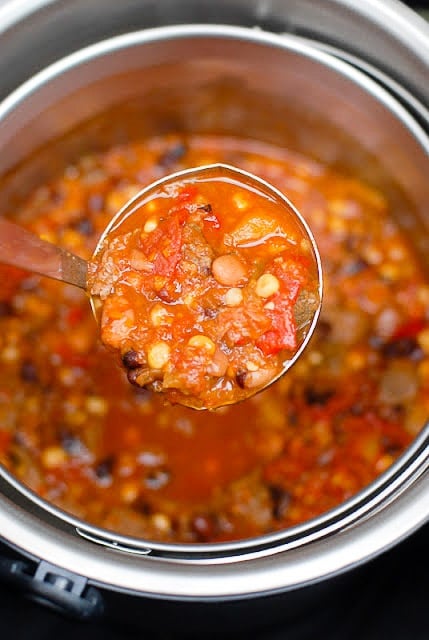 A close up of a metal pan filled with food, with Peppers and Sirloin steak