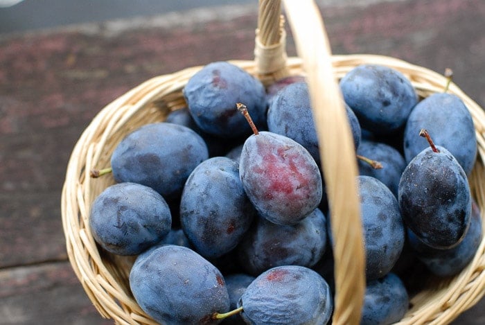 italian plums in basket