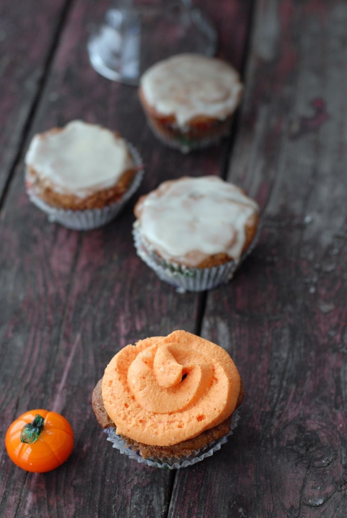 pumpkin spice cupcakes with glaze and frosting