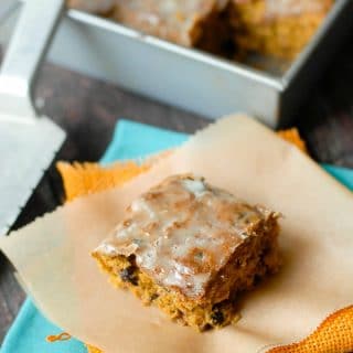 Perfect Pumpkin Bars. Pumpkin cake with nuts, raisins and a tasty orange glaze. Gluten-free and regular flour options. BoulderLocavore.com