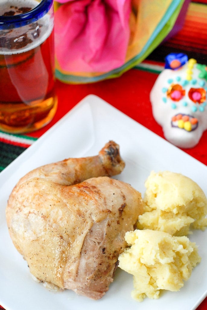 roast chicken quarter on plate 