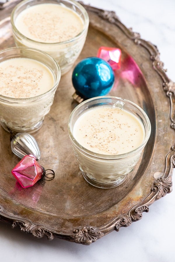 Boozy eggnog on silver tray