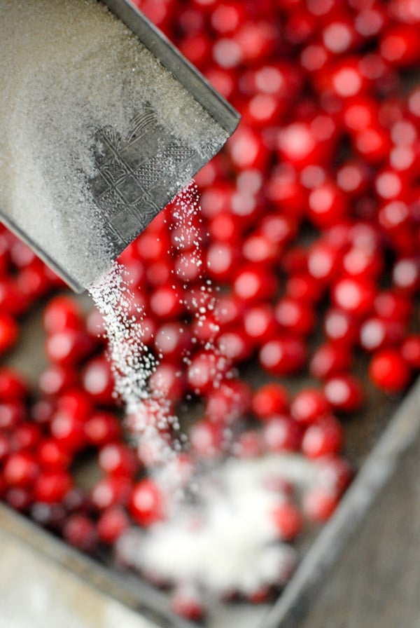 cranberries and pouring sugar