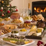 A table full of food, with Holiday and Christmas Day