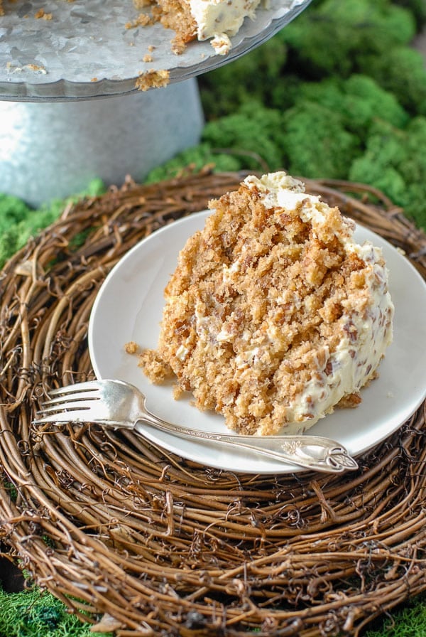 Slice of Hummingbird Cake on white plate