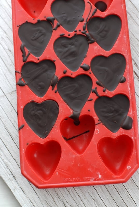 Dark chocolate hearts in mold