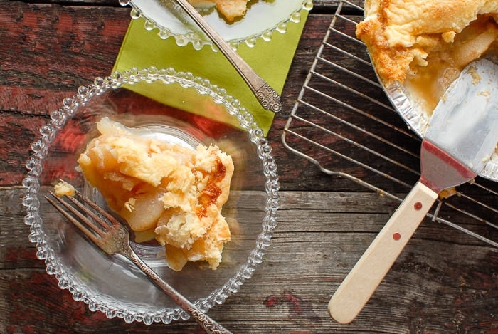 slice of Ginger Pear Pie on antique glass plate