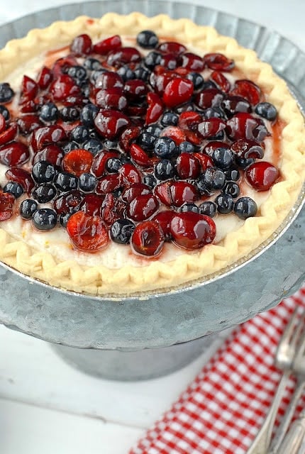 Cherry Blueberry Cloud Pie on a galvanized cake plate