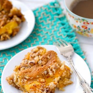 small white plate of Fresh Peach Sour Cream Coffee Cake