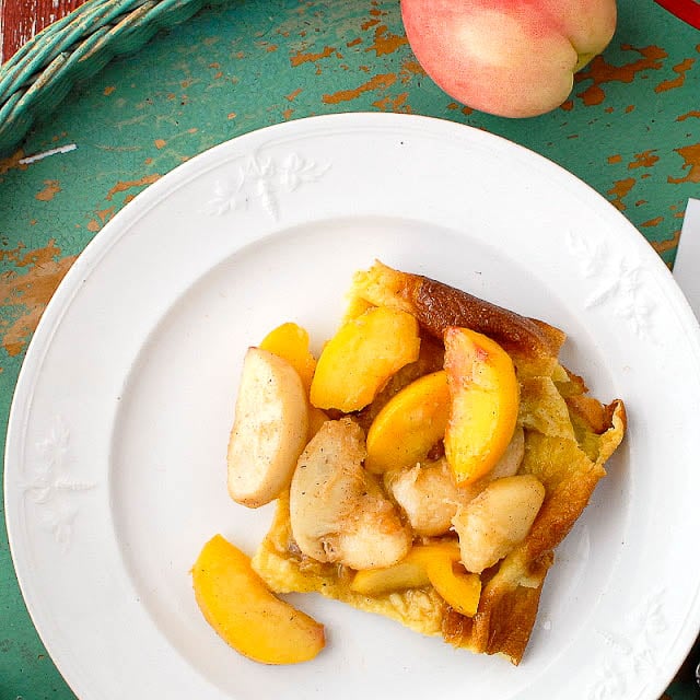 serving of Golden Baked Pancake with Sautéed Peaches