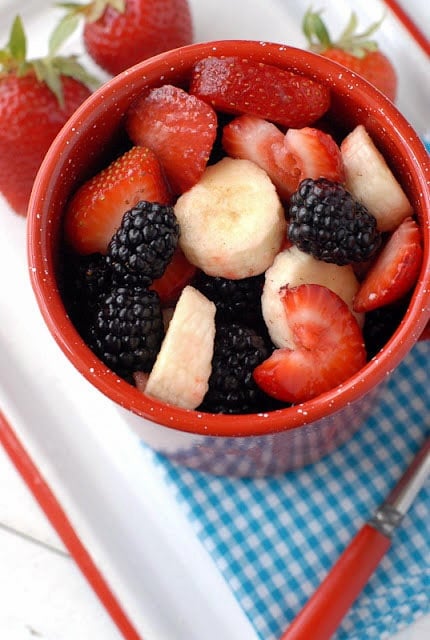 Raspberries, Blackberries, Banana in a red mug