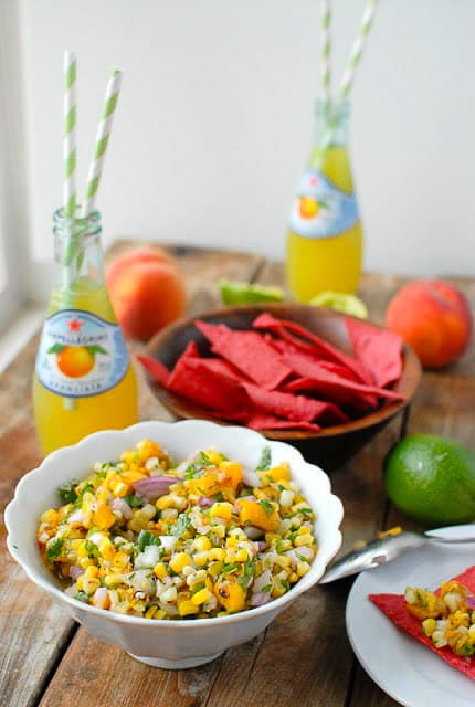 Grilled Peach and Corn Salsa with red corn tortilla chips, bottled lemonade, a fresh lime and peach 