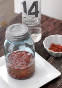 goji berry inused vodka infusing in jar