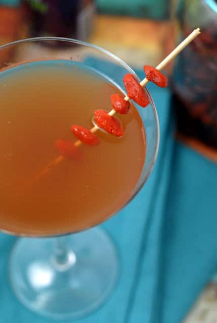 Goji Berry Infused Vodka Martini on blue napkin