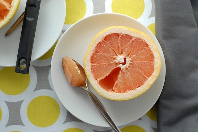 segmented grapefruit on plate