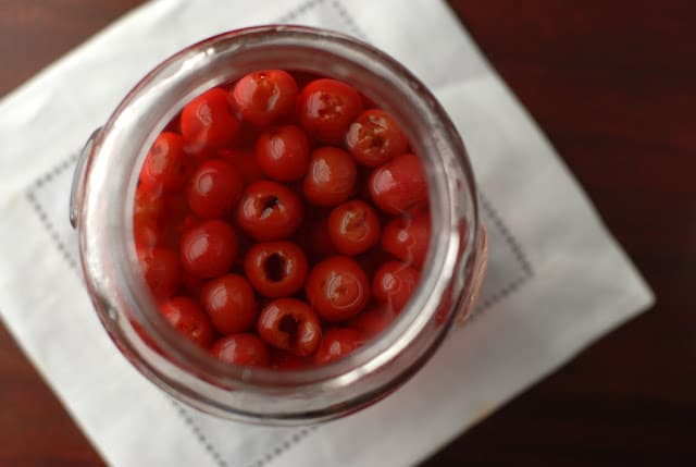 jar of homemade maraschino cherries