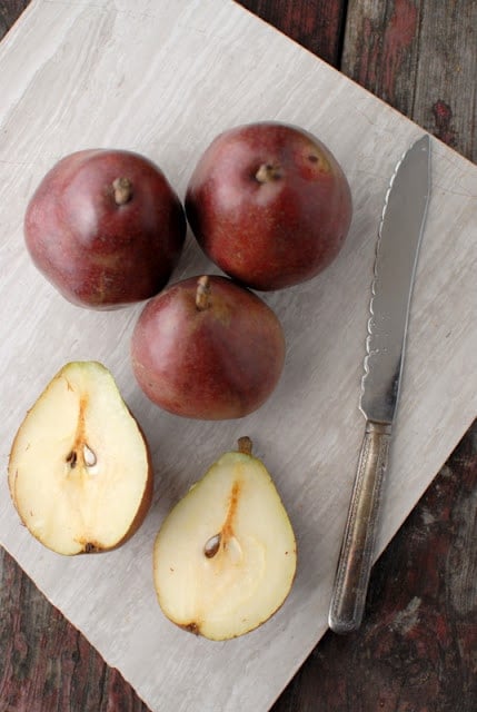 red pears whole and sliced