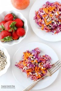 Crunchy Confetti Slaw with Strawberry-Peach Balsamic Dressing on white plates