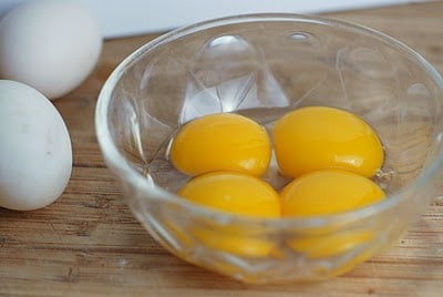 A bowl of eggs on a table