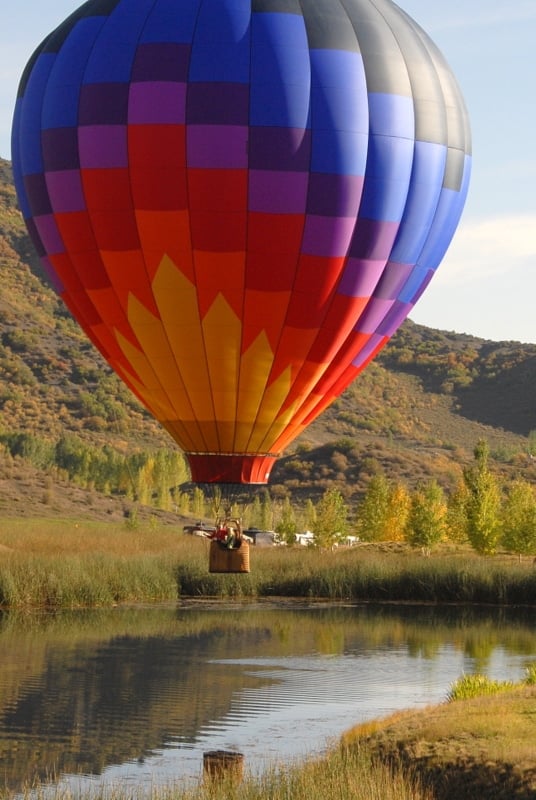 A large colorful balloon in the sky