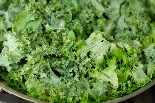 A close up of a bowl of kale