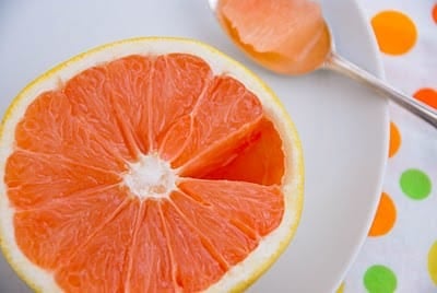 sectioned grapefruit on plate