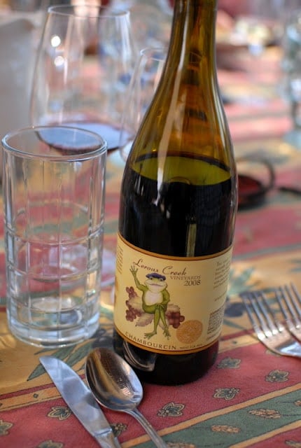 A bottle of wine on a table
