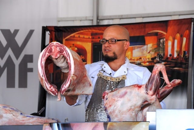 chef demonstrating meat carving butchery