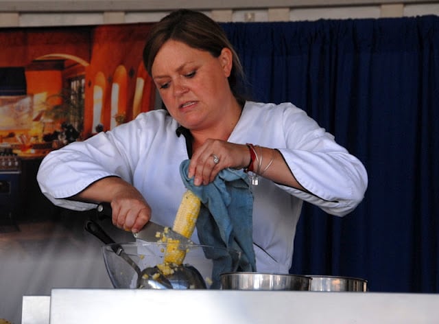 chef demonstration removing corn from cob