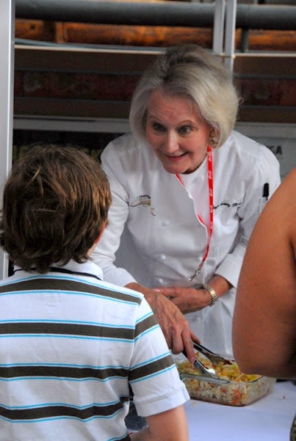 Chef Christy Rost talking to boy