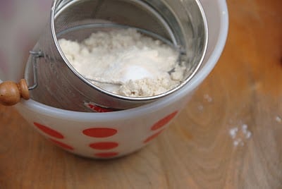 sifting dry ingredients for cookies