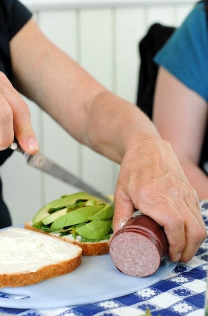 cutting summer sausage