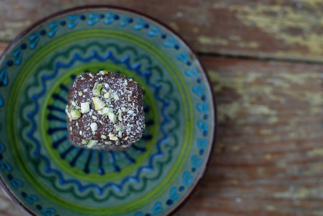 A blue plate, with Pistachio candy