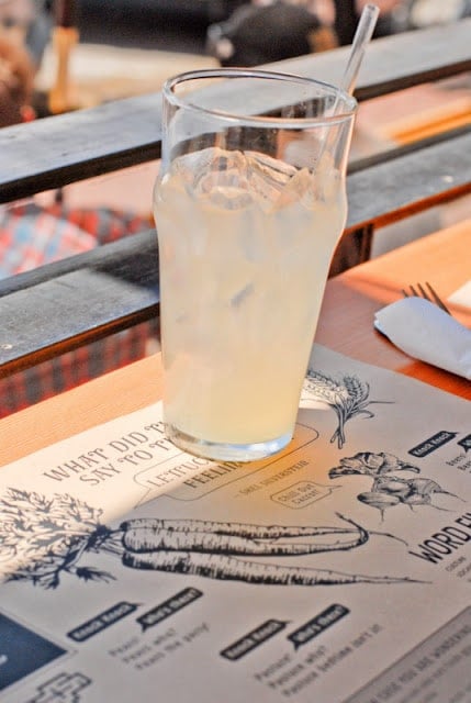 A cup of lemonade on a table