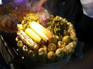 A person holding a bunch of bananas