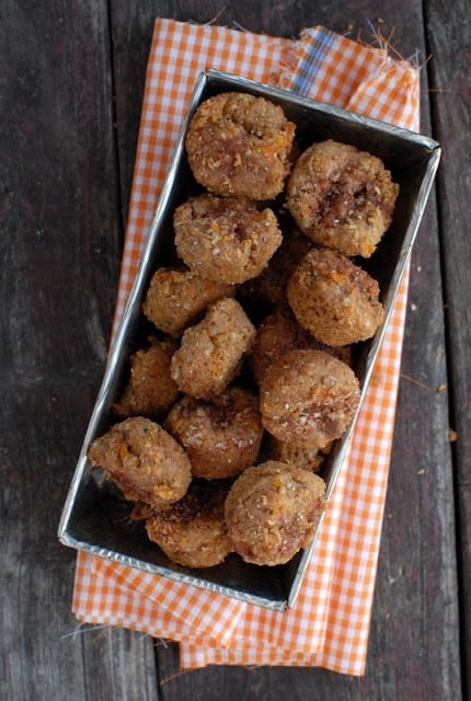 A box filled with spice muffins