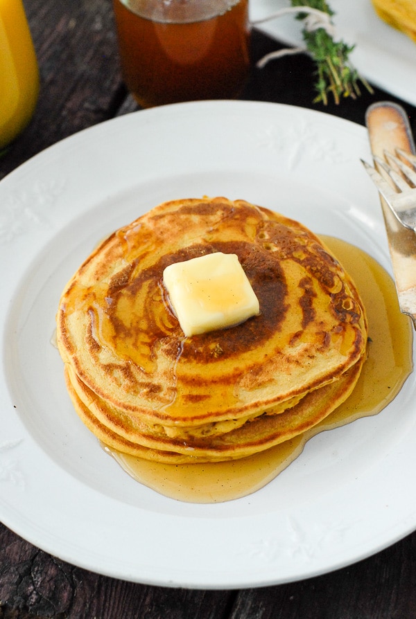 stack of pumpkin pancakes with butter and homemade pancakes syrup