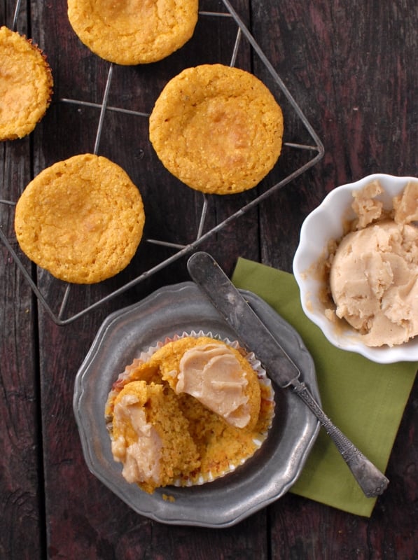 pumpkin cornbread muffins with whipped honey-maple cinnamon butter With knife